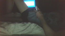 Skinny twink is jerking off his big twink dick on the bed