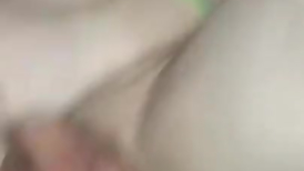 Pretty young twink is lying on the bed nude and jerking off