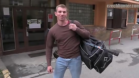 Sexy rugby player in uniform gives the amazing blowjob