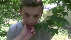 Teen twink gets seduced to show his dick for money in the park